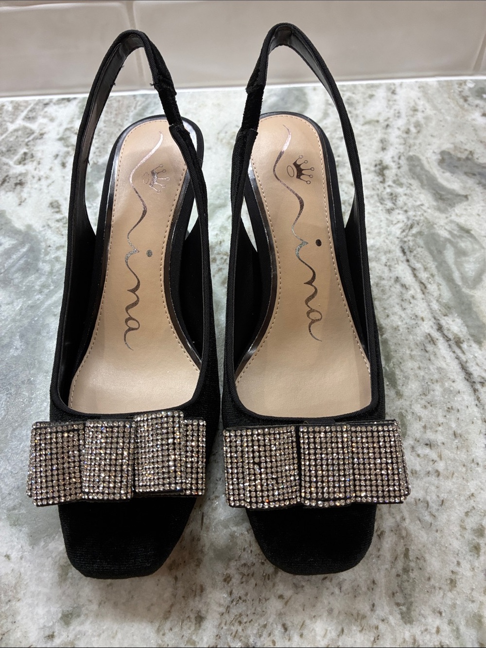 Nina Black Slingback Heels with Crystal Bow Accent.